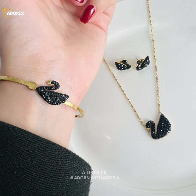 STAINLESS SWAN BANGLE SET